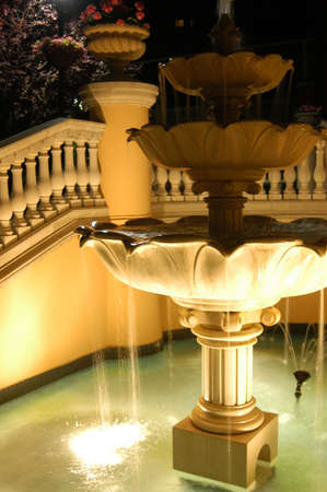 Night view of a water fountain at a resortの写真素材