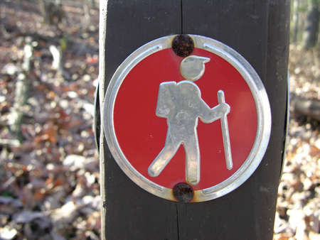           Hiking symbol on a tree marking a trailの写真素材