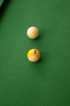 A game of pool with a shot lined up