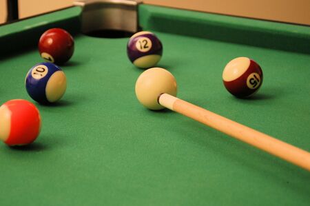A game of pool with a shot lined up