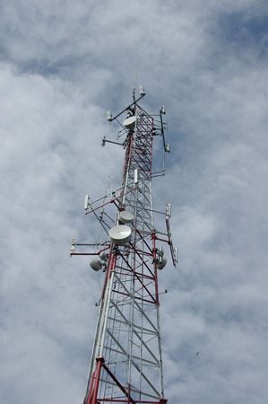A large cell phone tower rising into the skyの写真素材