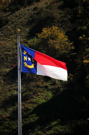 North Carolina and flag blowing in the breezeの写真素材