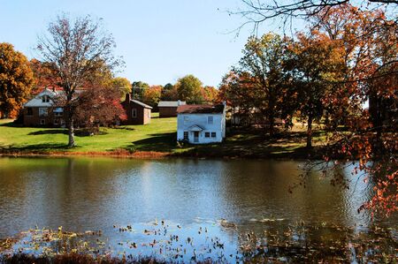 An old lake house during the fall of yearの写真素材