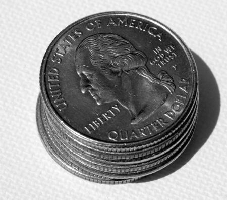 Pile of quarters stacked up and seen up closeの写真素材