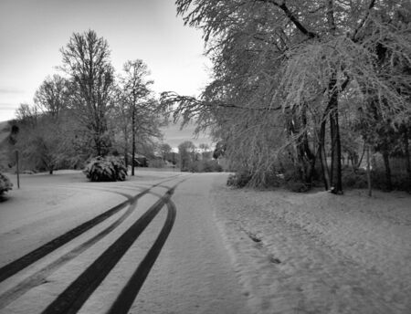 Tire tracks in the winter snowの写真素材