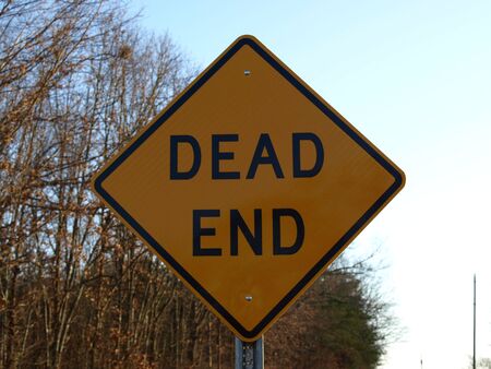A dead end road sign shown up closeの写真素材