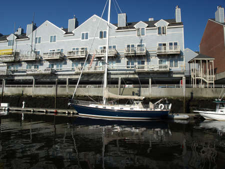 Sailing boat in harbor ready to start the day.の写真素材