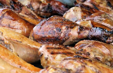 Drumsticks on a grill at the state fairの写真素材