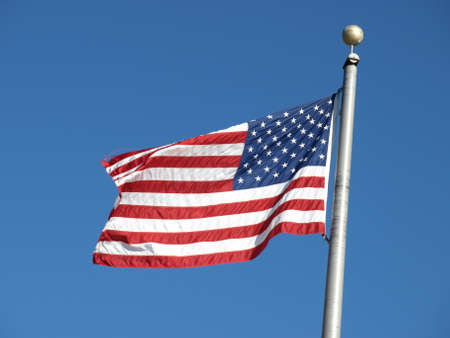 An american flag flying in the breeeze