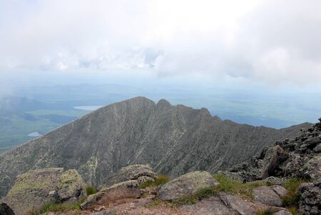 Mount Kathdin covered in clouds during the summerの写真素材