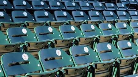 A row of seats in a baseball stadium before the fans arrive