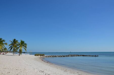 A sandy beach in Key West Florida during the summer.の写真素材