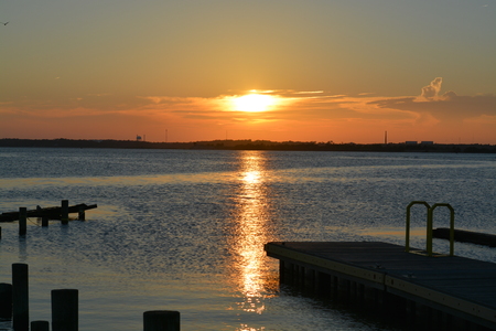 Sunset at the end of Pleasure Island in North Carolina.の写真素材