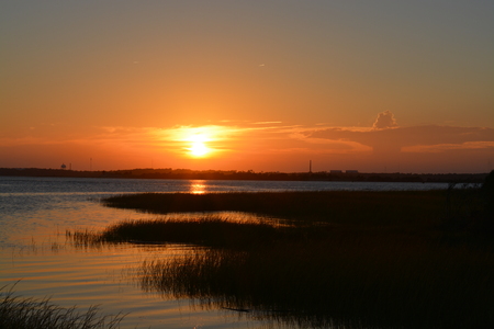 Golden Sunset at the end of Pleasure Island in North Carolina.の写真素材
