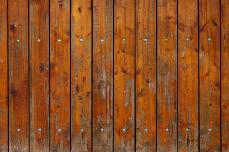 old wooden fence with studsの写真素材
