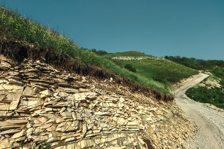 Winding country hiking road in the mountains leading up. Gelendzhik, North Caucasus, Russiaの写真素材