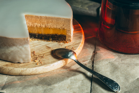 Homemade coffee puff cake on rustic background. Tea and spoonsの写真素材