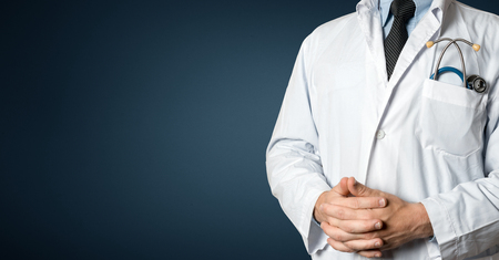 Closeup Man Doctor With Stethoscope. Healthcare Medicine Conceptの写真素材