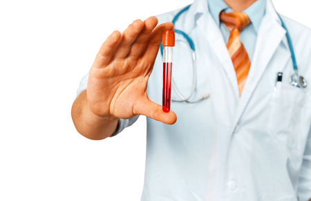Male Doctor In White Coat With A Stethoscope Holds A Test Tube In His Hand. Healthcare Medicine Conceptの写真素材