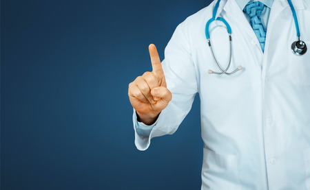 Young Doctor Pointing. Modern Technology In Healthcare And Medicine Conceptの写真素材