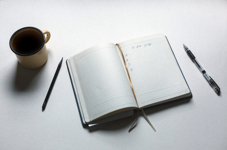 Opened Personal Organizer With A To Do List In Morning On White Backgroundの写真素材