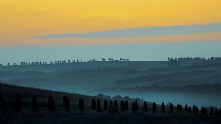 Beautiful sunrise and picturesque landscapes in Tuscanyの写真素材