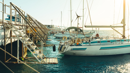 Sail Yachts At The Pier In Sunny Weather In Marinaの写真素材
