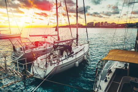Sailing Yachts Moored In Marina At Sunset. Travel Journey Conceptの写真素材
