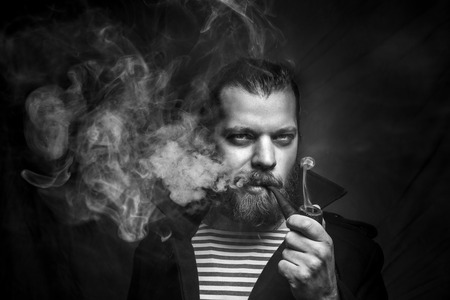 Artistic Sailor Man With Beard Smoking Pipe. CreativÑ Professional Portraitの写真素材