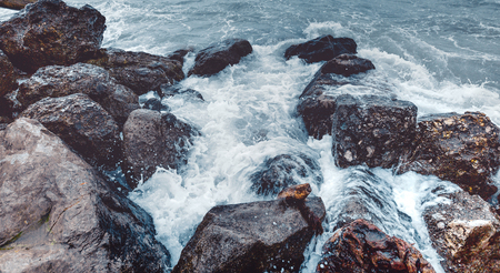 Element Strength Concept. Waves Breaking On The Shore With Sea Foam, Close-up. Nature Trevelの写真素材