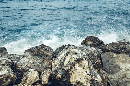 Element Strength Concept. Waves Breaking On The Shore With Sea Foam, Close-up. Nature Trevel Adventureの写真素材