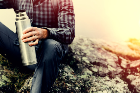 Hiking Adventure Tourism Concept. Unrecognizable Hiker Man Holding  In His Hand, Close-up Toned Imageの写真素材
