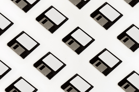Floppy Data Storage Diskettes On White Background. Old Retro Technologyの写真素材
