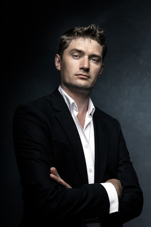 Handsome man in business suit, portraitの写真素材