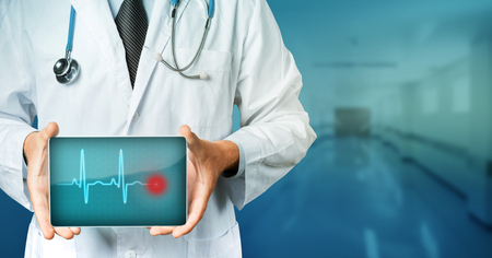 Doctor Holding Blank Digital Tablet With Copy-space And Clipping Path For Screen. Modern Technology In Medicine Conceptの写真素材
