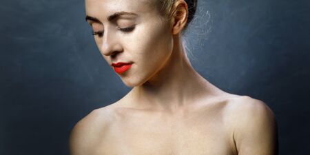 Portrait of Attractive Half-naked young Girl. Concept of Symbol of Female Beauty, Youth and Biohackingの写真素材
