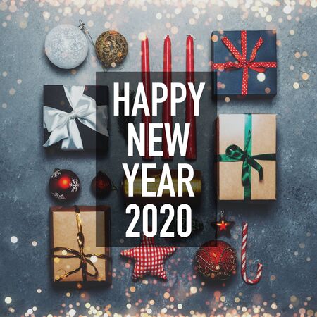 Christmas Gift Boxes And Baubles Collection In Grey Background With Snow, Top View. New Year Holidays Wrapping Ideas Conceptの写真素材