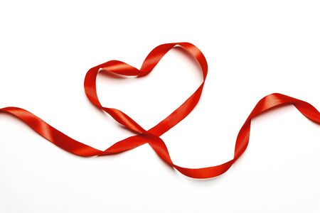 Ribbons Shaped As Heart On White, Valentines Day Wedding Concept. Global Concept And Symbol Of Love. Love and Holiday Greeting Card Backgroundの写真素材