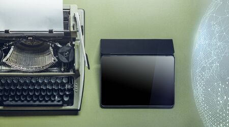 Analog Typewriter, Tablet, Global Network and Cloud Storage On Green Surface. Continuity Of Generations, Technology Development Conceptの写真素材