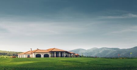 Golf Country Club On Background Of Mountains And Golf Courseの写真素材