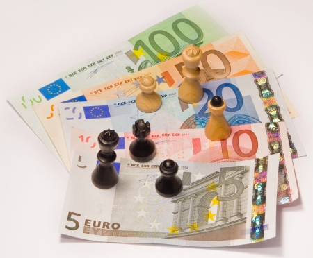Chess standing on euro currency  の写真素材