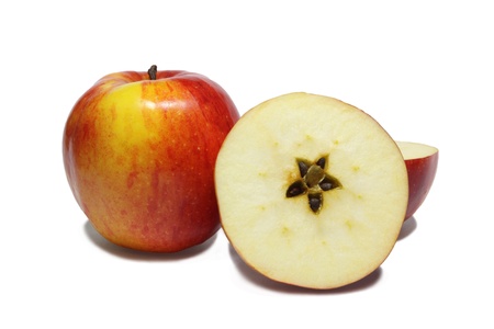 Christmas motive  star on section of apple on white background の写真素材