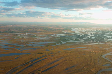 Airplane view of Amur (Heilong Jiang) river tributaries in Far East of Russiaの写真素材