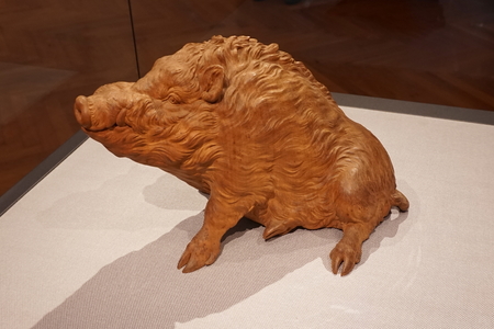 Yellow Earthen Boar. symbol 2019 year. Pig wood carving. chinese horoscope animalsの写真素材
