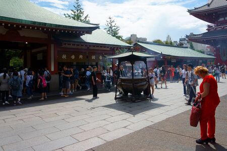 Tokyo, Japan - 10 Sept 2018: Many tourists of different nationalities in Asakusa Shrine. European tourists in Asiaのeditorial素材