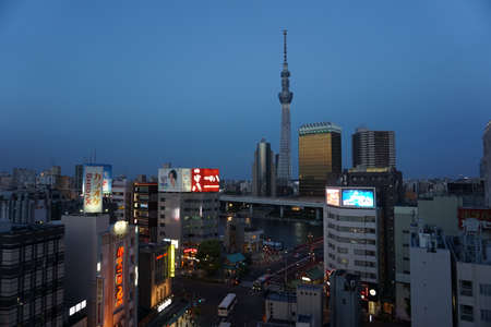 Tokyo / Japan - May 05 2019: Asakusa district aerial view. Cityscape of Asakusa with Tokyo Skytree in the evening. Sumida riverのeditorial素材