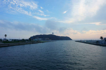Blue sky and sea, pier. Enoshima Island in the background. Japanの写真素材