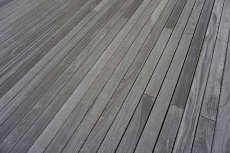 Abstract background. Gray wood floor. Narrow boardsの写真素材