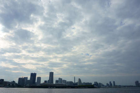 Low storm clouds over Yokohama cityの写真素材