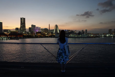 Japan, Kanagawa Prefecture. The enchantment of harbor lights. Yokohama after sunsetの写真素材
